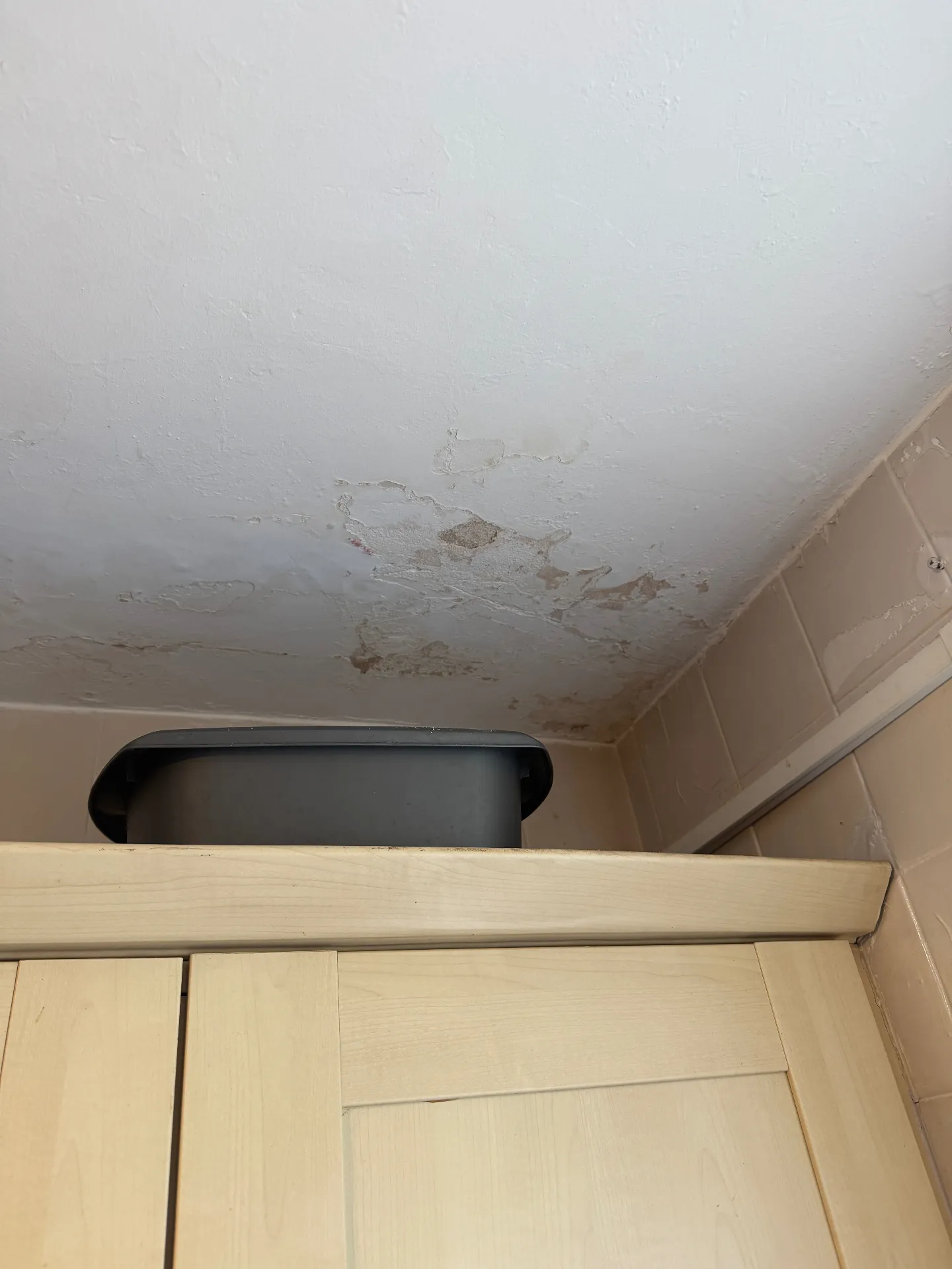 Damp patch on an external cavity wall linked to failed cavity wall insulation