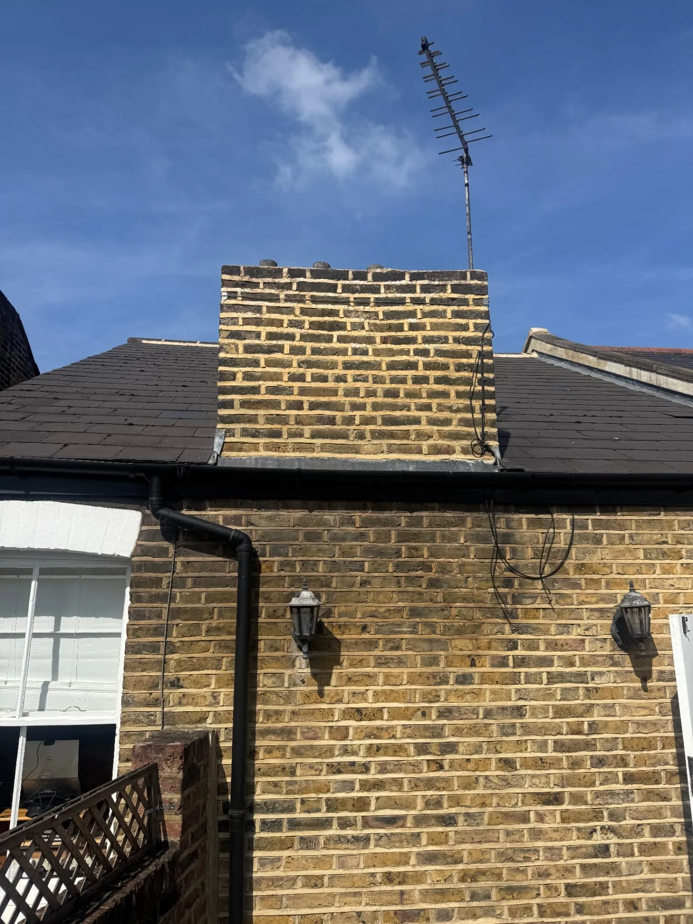 Victorian chimney stack with weathered pointing
